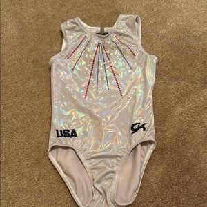 GK USA White Iridescent Bodysuit with Red and Blue accents.  made for Olympics.